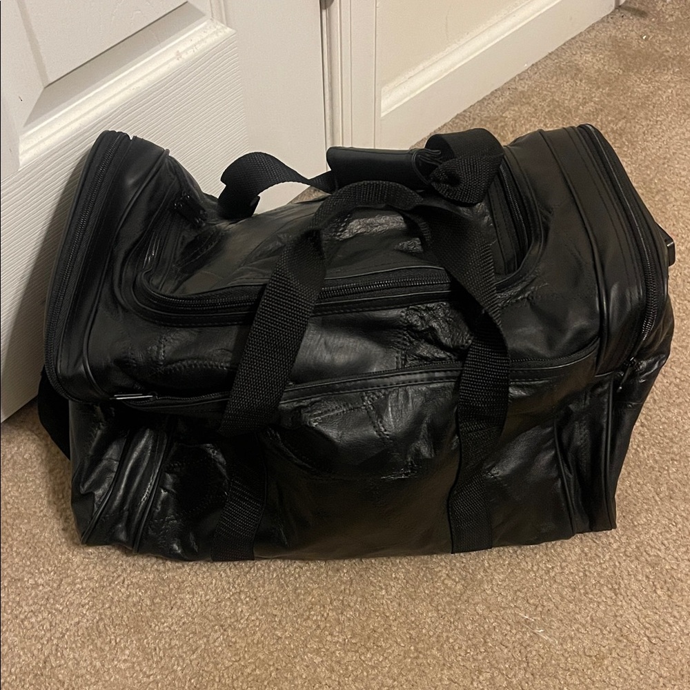 Black Leather multi- pockets Duffel Bag